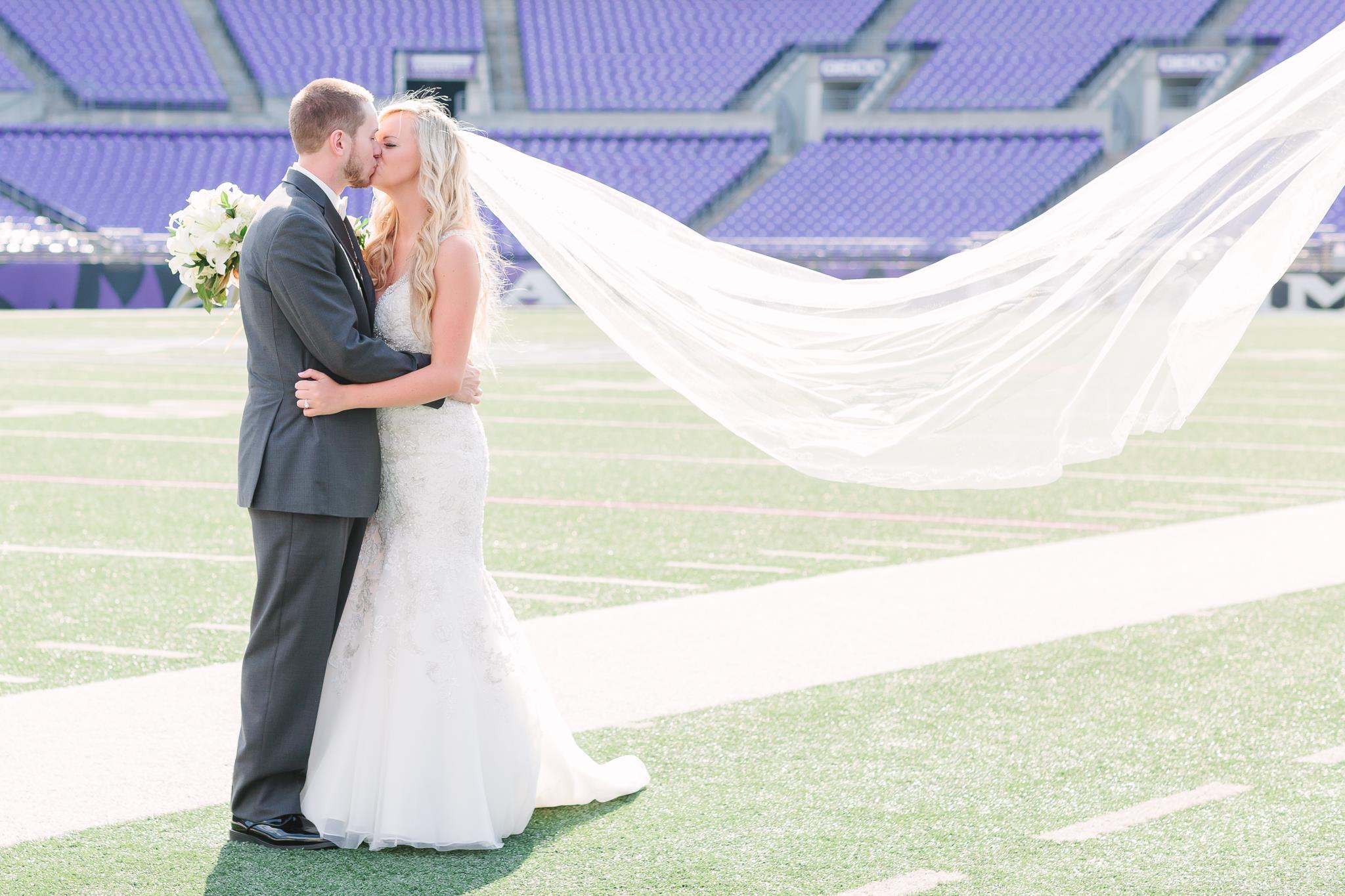 Kristin-Chris on the field.jpg